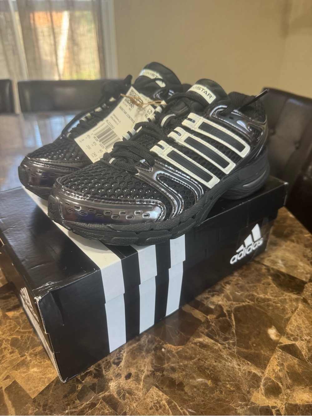adidas Men’s Black Sneakers with White Stripes